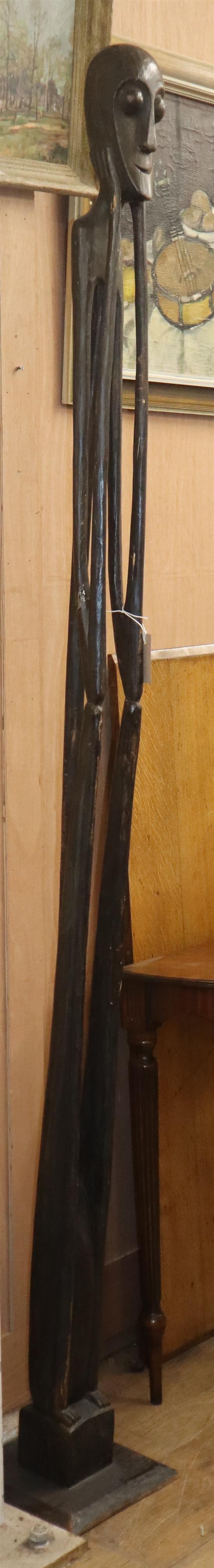An ethnographic tall wood figure H.210cm